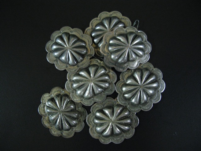 Seven Sterling Early Stamped Buttons